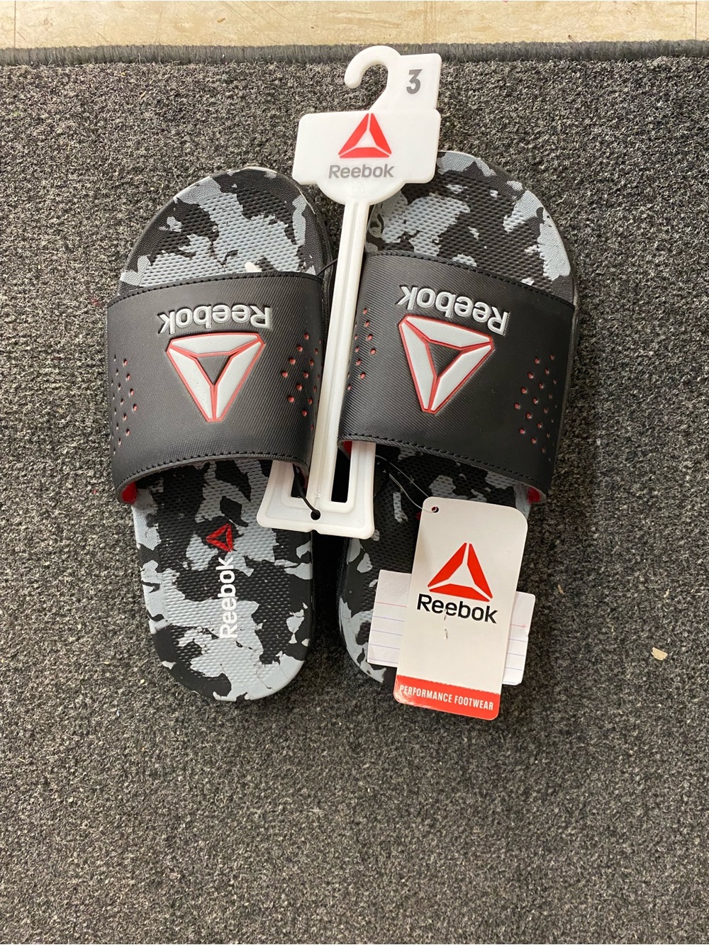 Reebok Black Slide Sandals with Gray Camo Footbed and Red Accents